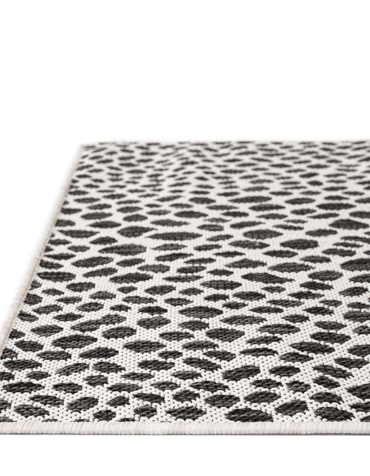 Achteck Outdoor Teppich Tulum Outdoor in Schwarz von Hadorn™ - Lifestyle Image