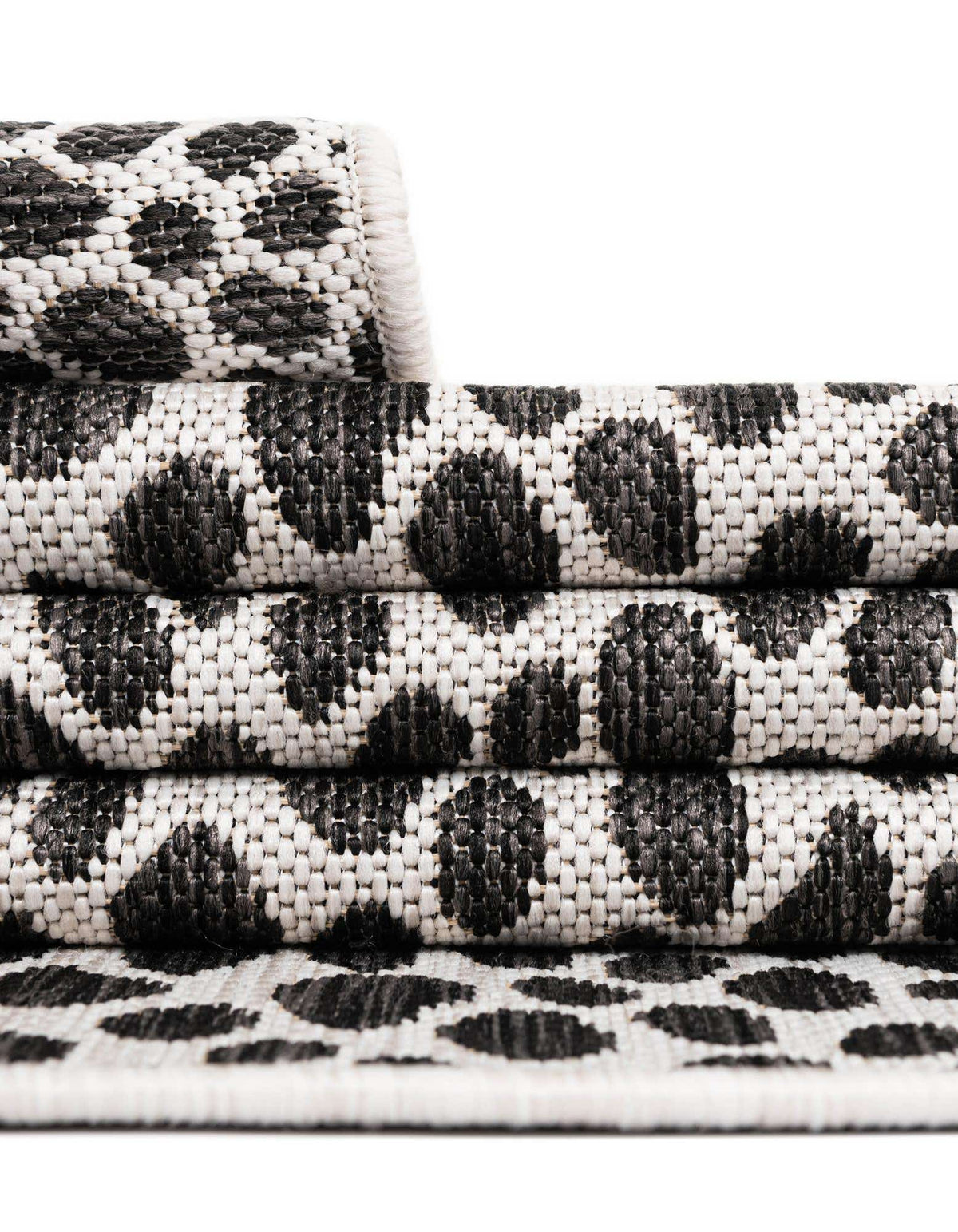 Achteck Outdoor Teppich Tulum Outdoor in Schwarz von Hadorn™ - Lifestyle Image