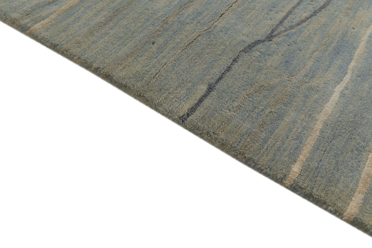 Wolle Teppich Luna in Blau von Hadorn™ - Lifestyle Image