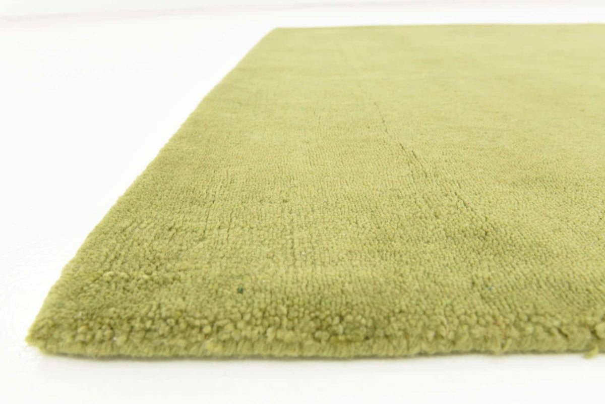 Wolle Teppich Gabbeh Design in Grün von Hadorn™ - Lifestyle Image