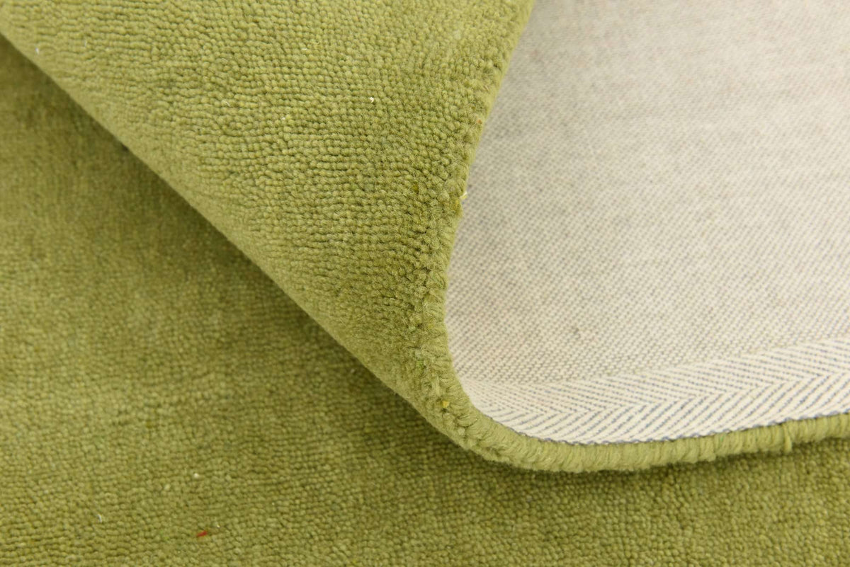 Wolle Teppich Gabbeh Design in Grün von Hadorn™ - Lifestyle Image