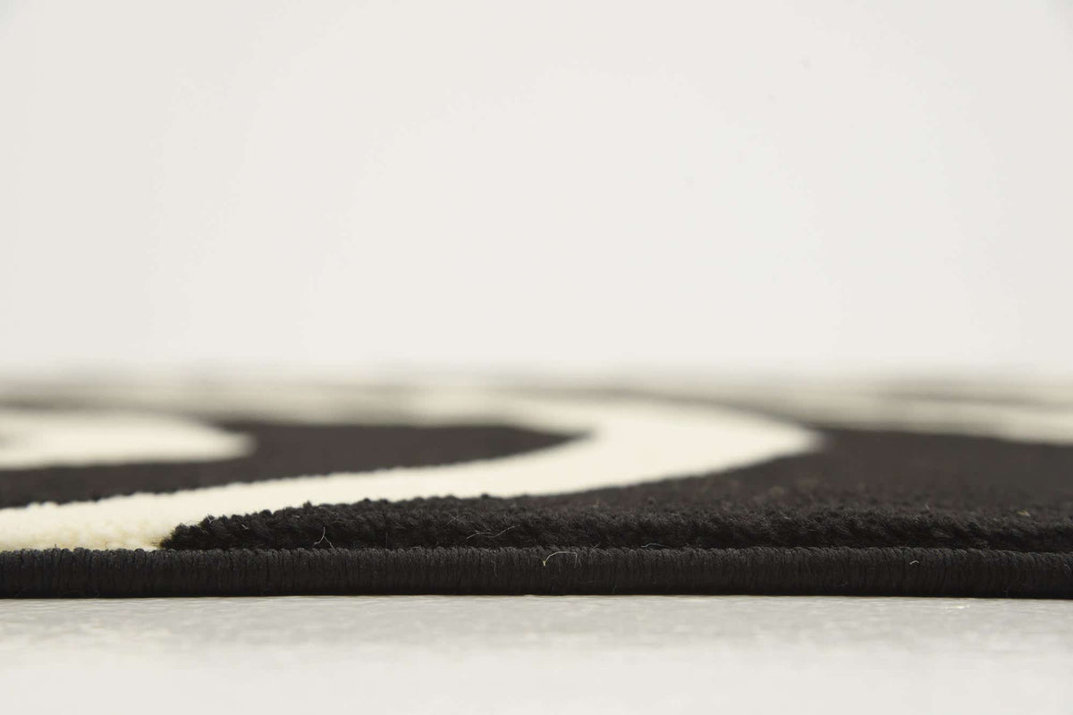 Rechteck Teppich Safari in Schwarz von Hadorn™ - Lifestyle Image